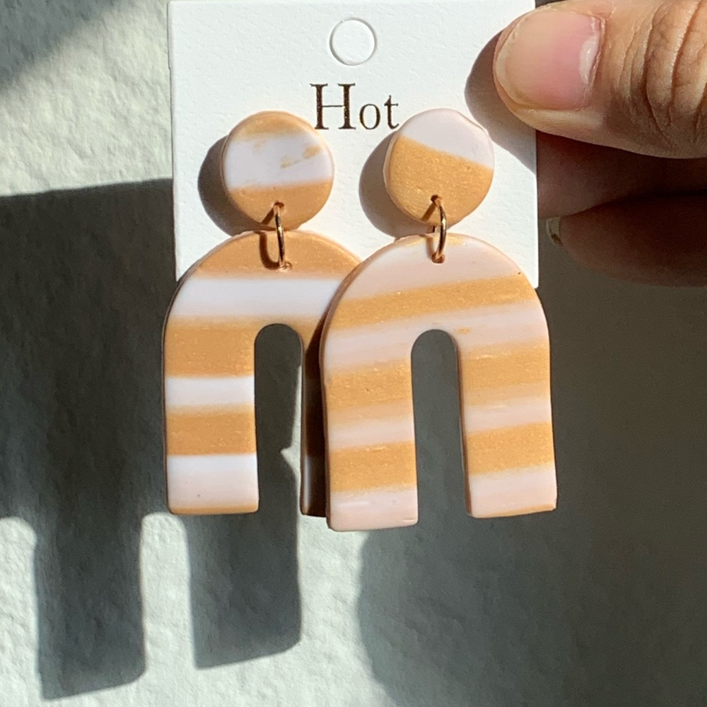 Gold arch earring